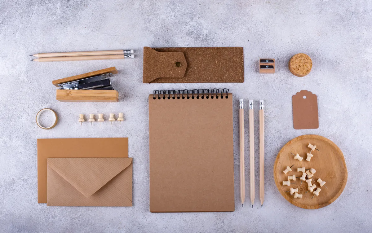 Plastic-free writing tools including a bamboo pen and notebook.